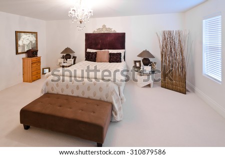 Nicely decorated luxury bedroom. Interior design.