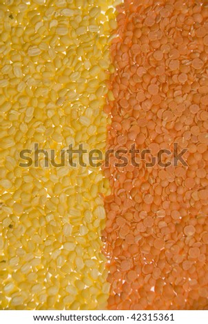 Red Lentils and Yellow Lentils Isolated on a White Background
