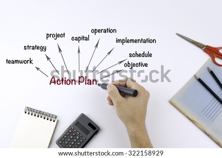 business man writing action plan