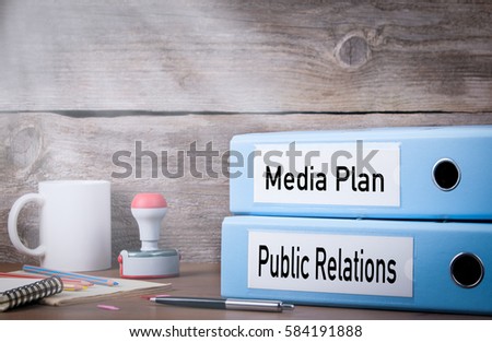 Public Relations and Media Plan. Two binders on desk in the office. Business background Photo stock © 