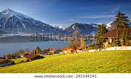 Beautiful sunshine near Thun lake in Switzerland Alps in winter
