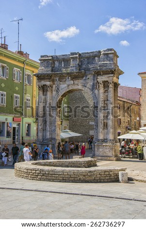 PULA, CROATIA - AUGUST 29, 2013: Triumphal arch of Roman antique era in Pula