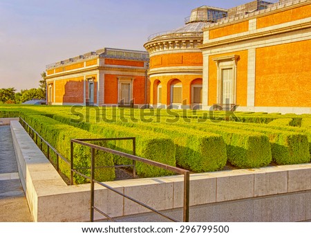 MADRID, SPAIN - AUGUST 12, 2010: Small green park and Prado Museum in Madrid, Spain in the morning