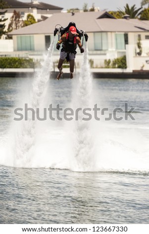 GOLD COAST  AUSTRALIA  JAN  1: Unidentified man flying  with  one of the first kind \