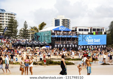 SNAPPER ROCKS, GOLD COAST, AUSTRALIA - 9 MARCH: Spectators on the beach waiting to start the  Quicksilver & Roxy Pro World Title Event. 9 March 2013, Snapper Rocks, Gold Coast, Australia