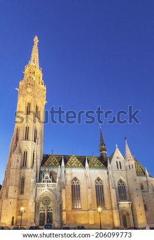 BUDAPEST MAY 8 2014: Newly renovated Mathias Church in Budapest is a big attraction for tourists all over the world. Budapest\'s beauty shown at night through many centuries of architecture, Hungary.