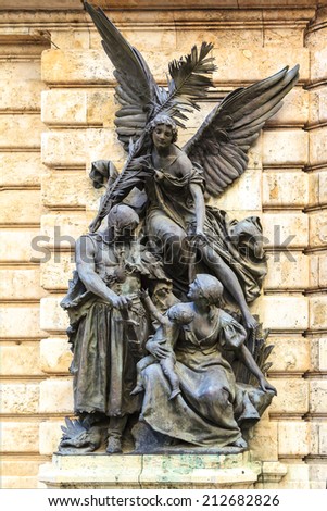 BUDAPEST - MAY 2: The imposing Buda Castle with classic statues overlooks the city from its elevated position atop Castle Hill, rising 48 meters above the Danube on May 2, 2014 in Budapest