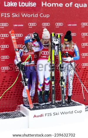 LAKE LOUISE ALBERTA CANADA , ITALY 6 December 2014.  The winning USA Team poising for photographers after the Ladies Super G event. The winner (Lindsey Vonn-in the middle).with her two USA team mates.
