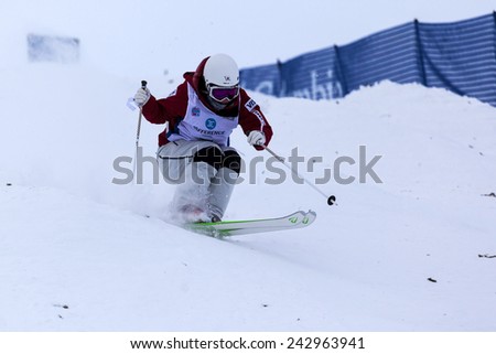 CALGARY CANADA JAN  3  2015.  FIS Freestyle Ski World Cup, Winsport, Calgary Ms. Junko Hoshino from Japan at the Mogul Free Style World Cup on race day.