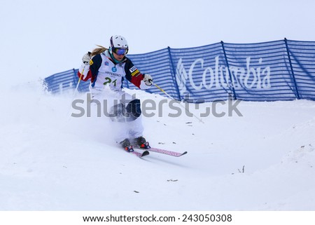 CALGARY CANADA JAN  3  2015.  FIS Freestyle Ski World Cup, Winsport, Calgary Ms. K.C. Oakley  from USA  at the Mogul Free Style World Cup on race day.