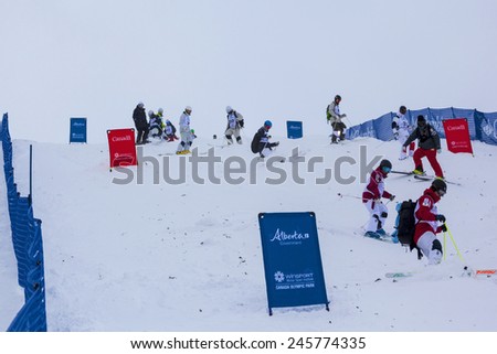 CALGARY CANADA JAN 3 2015. FIS Freestyle Ski World Cup, Winsport, Calgary all the contenders testing the slope from all around the World at the Mogul Free Style World Cup on race day.