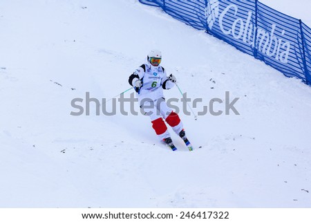 CALGARY CANADA JAN 3 2015. FIS Freestyle Ski World Cup, Winsport, Calgary Ms. Andi  Naude  from Canada at the Mogul Free Style World Cup on race day.
