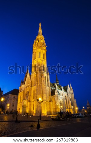 BUDAPEST MAY 9 2014: Newly renovated Mathias Church in Budapest is a big attraction for tourists all over the world. Budapest\'s beauty shown at night through many centuries of architecture, Hungary.