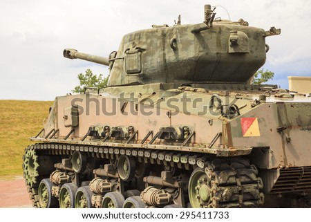 CALGARY CANADA-JUN 13: Exhibits outside the Military Museums  in Calgary, Alberta Canada. It is made of museums dedicated to representing Canada\'s navy, army, and air force.  Sherman tank on display
