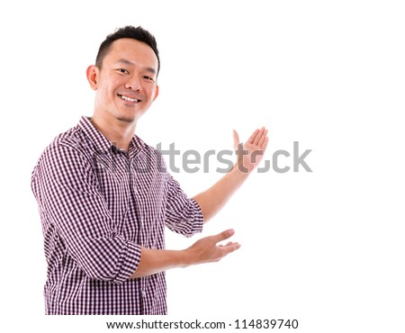 Portrait of an Asian man showing something on white background.