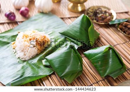 Nasi lemak, popular traditional Malaysia food wrapped with banana leaf.
