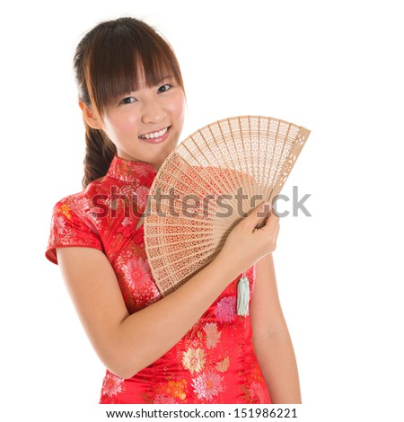 Asian Woman With Chinese Traditional Dress Cheongsam Or Qipao Holding ...