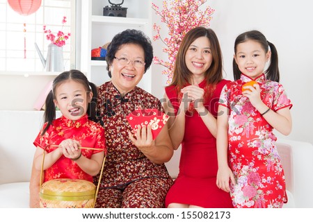 Multi generations Asian family celebrate Chinese new year at home.