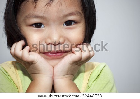 http://image.shutterstock.com/display_pic_with_logo/85819/85819,1245634065,1/stock-photo-portrait-of-a-little-asian-girl-32446738.jpg