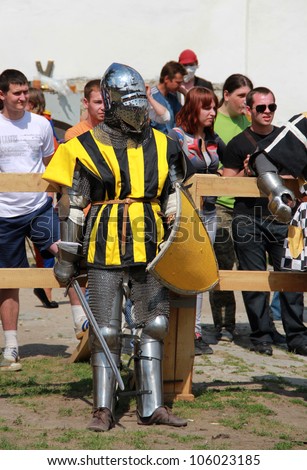 KAMYANETS-PODILSKY, UKRAINE- JUNE 2: Undefined knight in armor during Forpost (The Outpost) Festival of Medieval Culture on June 2, 2012 in Kamyanets-Podilsky, Ukraine