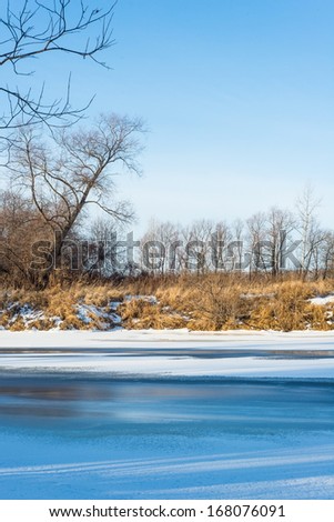Winter landscape on the river