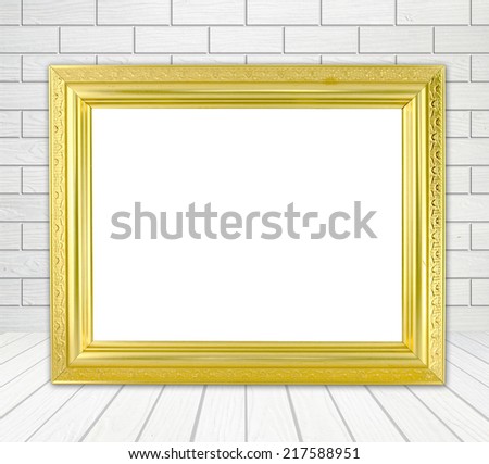 blank golden frame in room with white wood wall (block style) and wood floor background