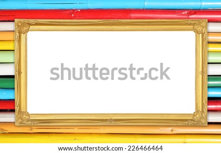 blank golden frame on colorful bamboo wall background
