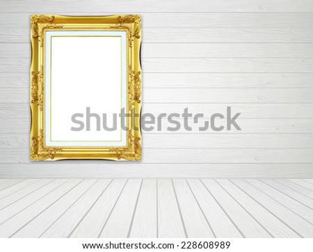 blank golden frame in room with white wood wall and wood floor background