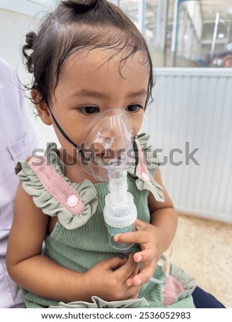 Similar – Image, Stock Photo Doctor applying a medicine during inhalation to senior man suffering from lung disease. Covid-19 or coronavirus treatment
