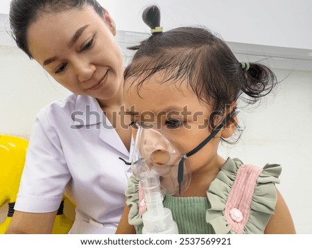 Similar – Image, Stock Photo Doctor applying a medicine during inhalation to senior man suffering from lung disease. Covid-19 or coronavirus treatment