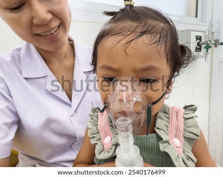 Similar – Image, Stock Photo Doctor applying a medicine during inhalation to senior man suffering from lung disease. Covid-19 or coronavirus treatment
