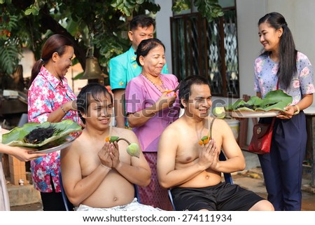 NAKHON RATCHASIMA, THAILAND-APRIL 12: Male who will be monk cut hair for be Ordained to new monk on April 12, 2015 in the Chae Temple,Nakhon Ratchasima,Thailand