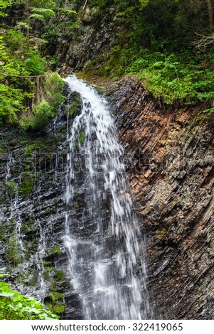 summer landscape waterfall in the Carpathian mountains