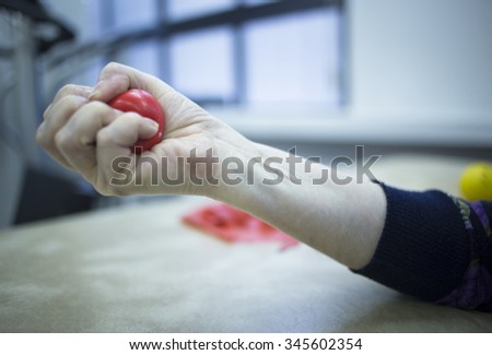 Similar – Image, Stock Photo rehabilitation therapy. Hands treating a young woman’s shoulder