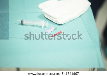 Surgery anaesthetic hypodermic syringe instrumentation in emergency room operating theater operation. Сток-фото © 