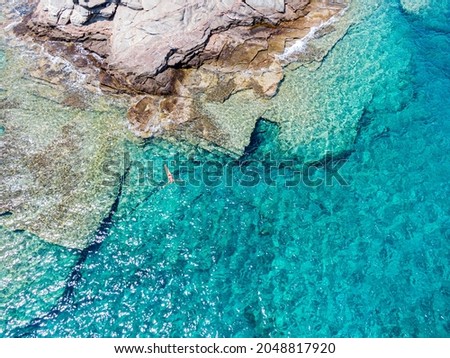 Similar – Image, Stock Photo Woman swimming in clean water