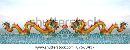 Two chinese dragon statue on the clouds.