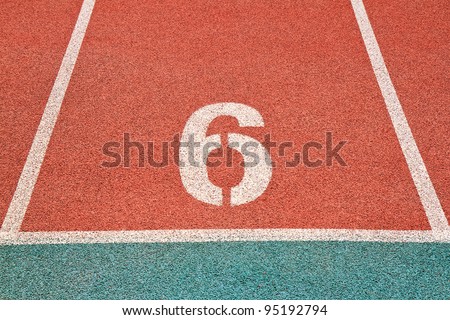Number one on the start of a running track