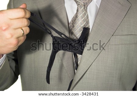a man pulls bra out of the suit pocket (morning surprise 3)