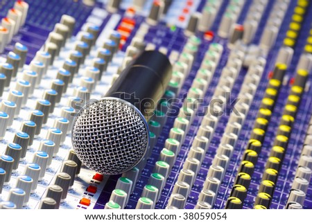 Microphone on the mixing desk sound studio