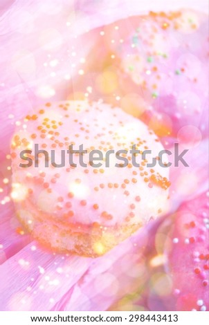 Background with set of small cupcakes overlaid by sparkling texture for your design