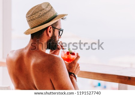 Similar – Image, Stock Photo Man enjoying a cocktail on the lounger in summer