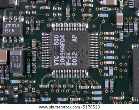 Macro image of surface mount chips, resistors, capacitors and other electronic components.