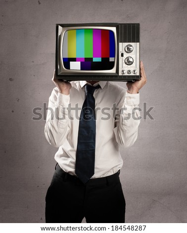 businessman with old retro television on his head