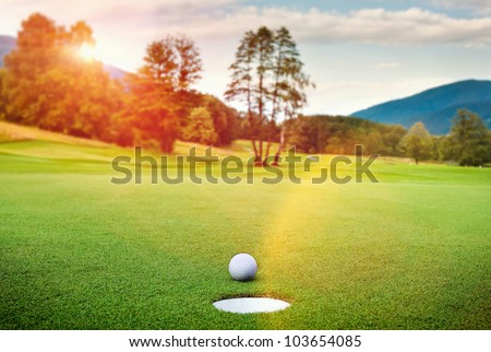 golf ball on tee in a beautiful golf club