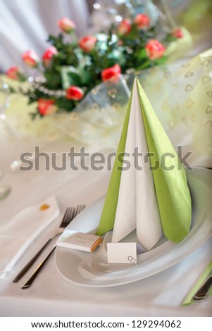 Festive table setting for wedding, Valentine or other event ( Empty place cards on the white festive table )