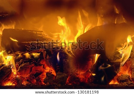 A small fire in the fireplace to smoke