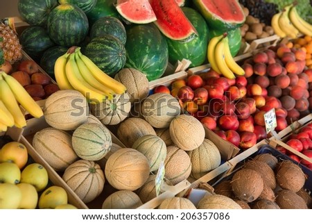 Fresh organic fruits and vegetables on market stall