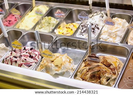 Variety of yummy ice creams under shopping window