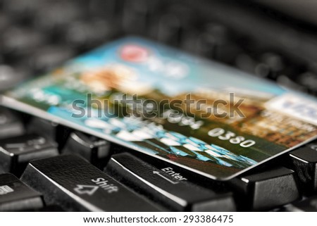Close- up view on payment card na keyboard